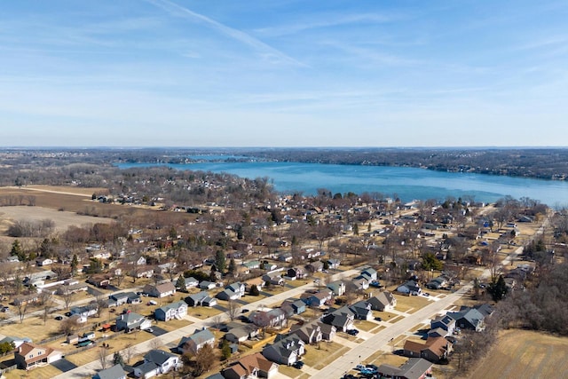 aerial view with a water view and a residential view