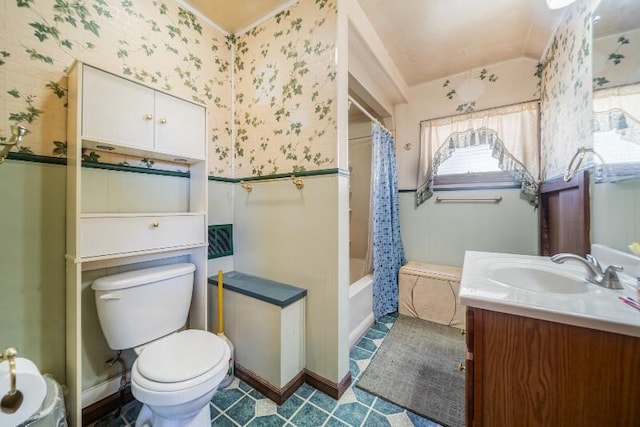 bathroom with shower / bath combo with shower curtain, toilet, wallpapered walls, vanity, and vaulted ceiling