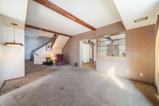 unfurnished living room featuring beam ceiling, stairs, baseboards, and carpet floors