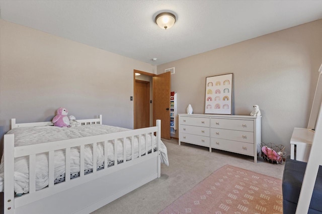 bedroom with carpet and visible vents