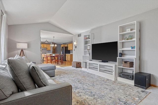 living room with light carpet, lofted ceiling, built in features, baseboards, and a chandelier