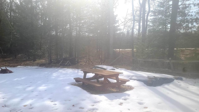 view of yard covered in snow