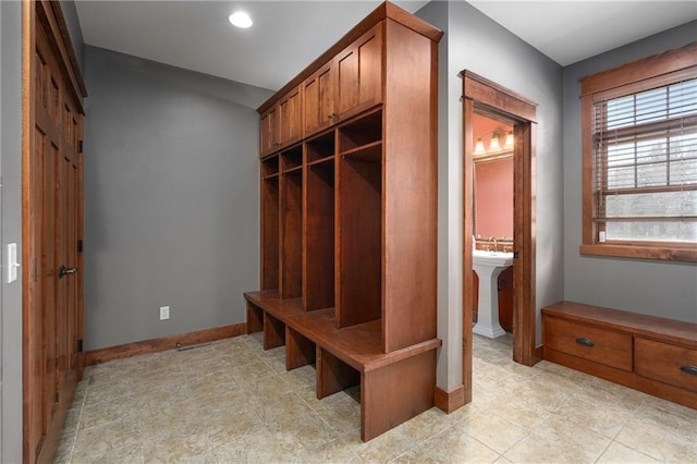 mudroom featuring baseboards