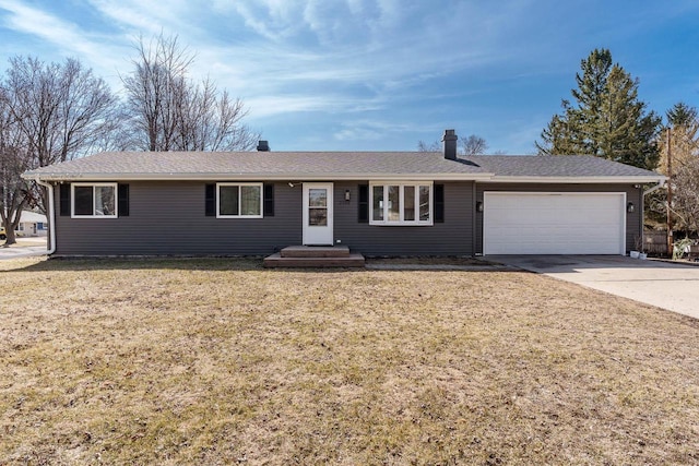 single story home with a garage, a front lawn, and driveway