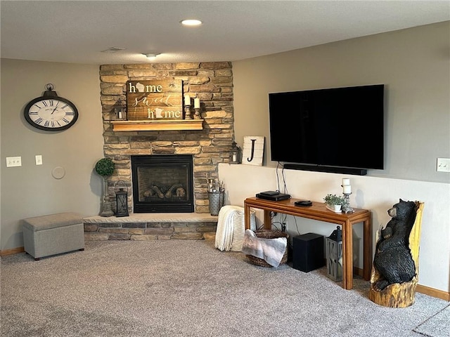 living room with visible vents, recessed lighting, a fireplace, carpet flooring, and baseboards