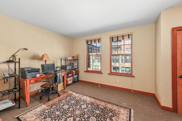 carpeted office with baseboards