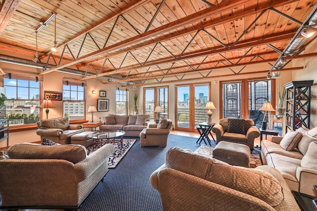 living room with a view of city, wood ceiling, and carpet flooring