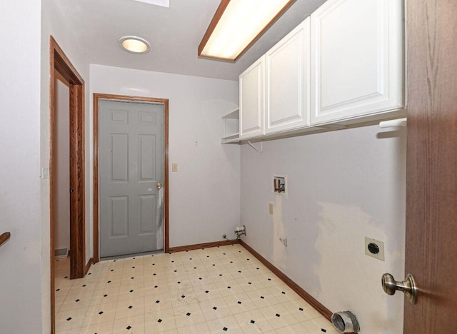 washroom featuring baseboards, light floors, hookup for a washing machine, cabinet space, and hookup for an electric dryer