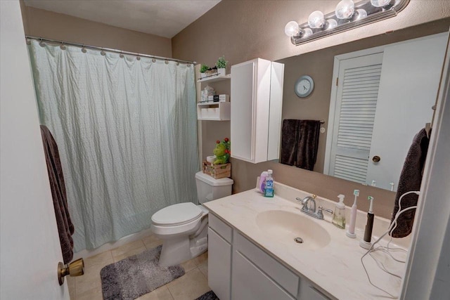 full bath featuring curtained shower, toilet, vanity, and tile patterned flooring