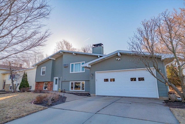 view of front of home featuring an attached garage, cooling unit, driveway, and a chimney