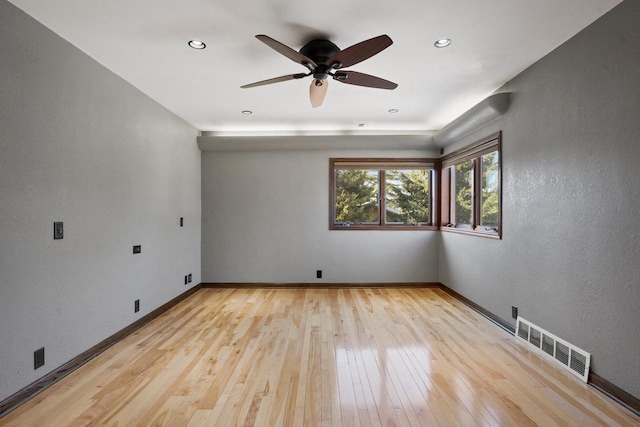 unfurnished room featuring visible vents, baseboards, ceiling fan, recessed lighting, and light wood-style flooring