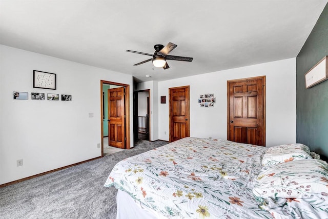 carpeted bedroom featuring a ceiling fan and baseboards