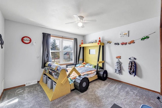 bedroom featuring visible vents, a ceiling fan, baseboards, and carpet floors