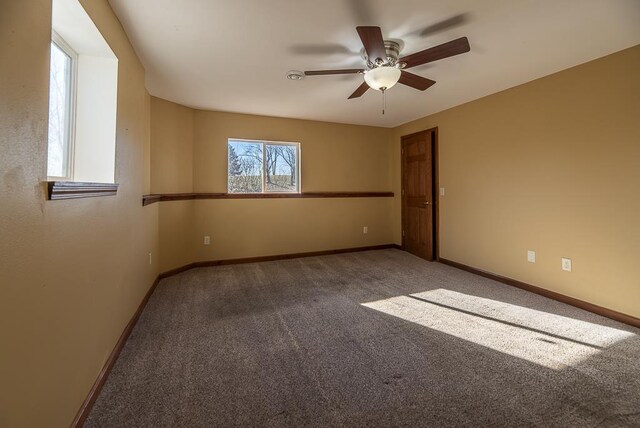 5628 E Eagle Dr, Milton, WI 53563 - carpeted spare room featuring baseboards and a ceiling fan