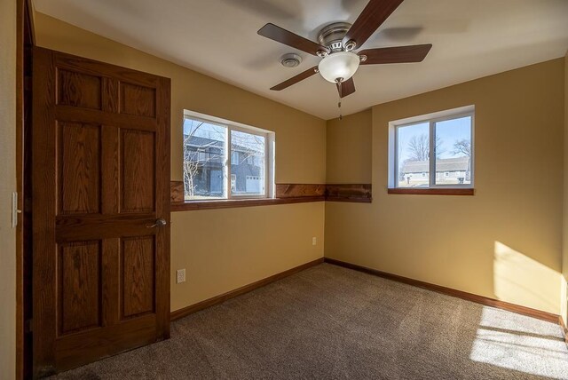 5628 E Eagle Dr, Milton, WI 53563 - interior space featuring visible vents, baseboards, and ceiling fan