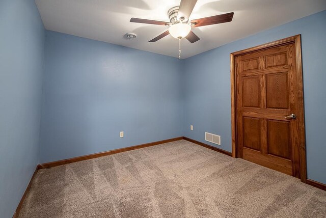 5628 E Eagle Dr, Milton, WI 53563 - carpeted empty room featuring a ceiling fan, visible vents, and baseboards