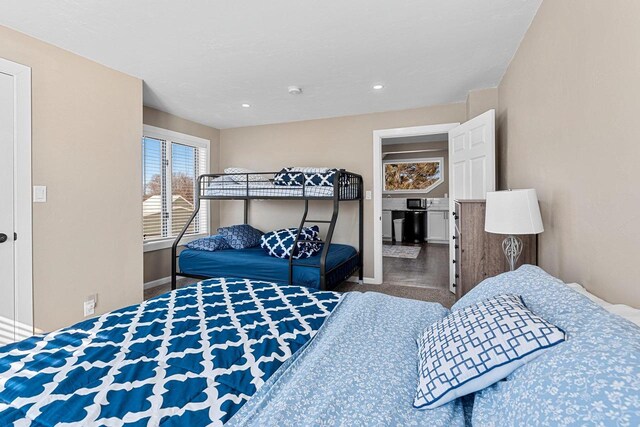 bedroom featuring recessed lighting and baseboards