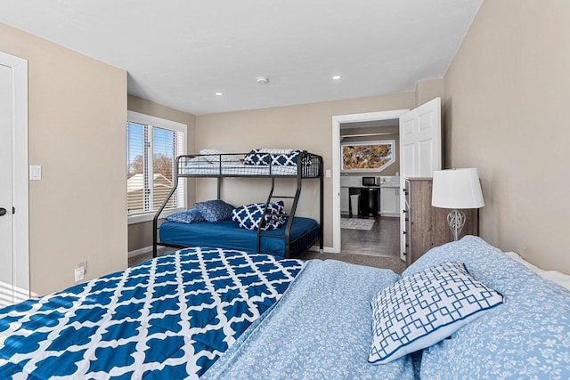 bedroom with recessed lighting and baseboards