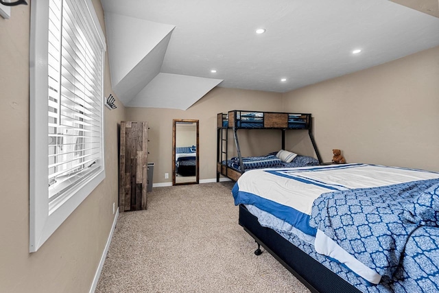 bedroom with carpet flooring, recessed lighting, baseboards, and vaulted ceiling