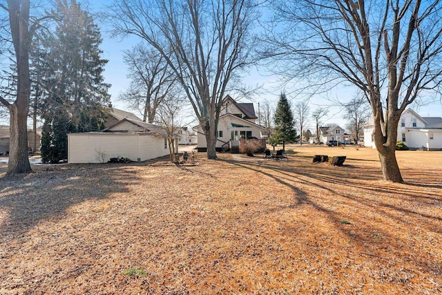 view of yard featuring a residential view