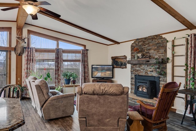 living room featuring beamed ceiling, a ceiling fan, dark wood finished floors, a fireplace, and crown molding