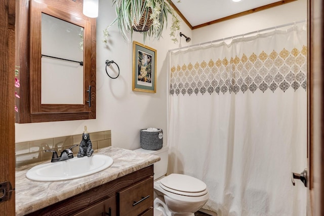 full bathroom featuring curtained shower, toilet, ornamental molding, and vanity