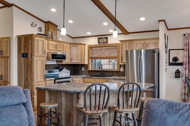 kitchen featuring a sink, decorative backsplash, stainless steel appliances, crown molding, and open floor plan