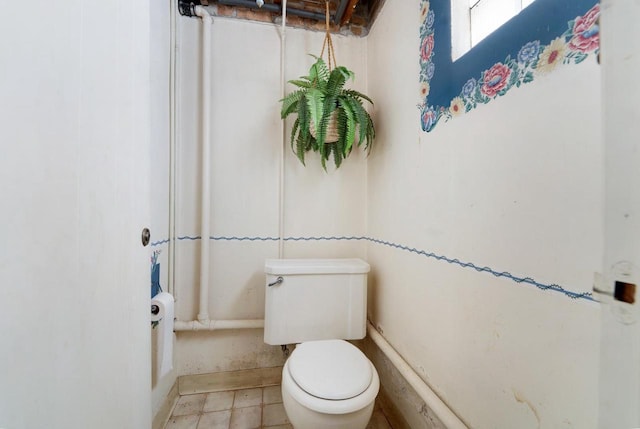 bathroom featuring toilet