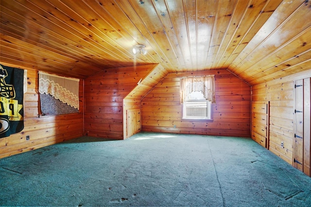 bonus room with lofted ceiling, wooden walls, and wooden ceiling