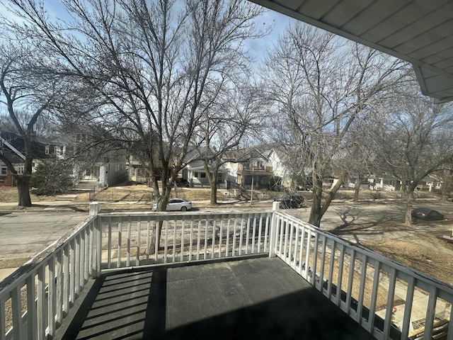 balcony featuring a residential view