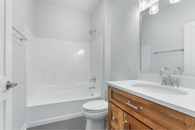 bathroom featuring tile patterned flooring, vanity, toilet, and shower / bathing tub combination