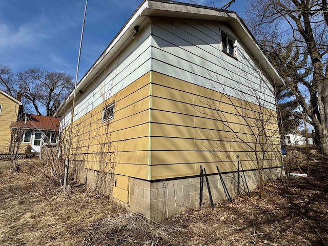 view of property exterior featuring crawl space