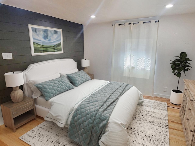 bedroom featuring recessed lighting and light wood-style flooring