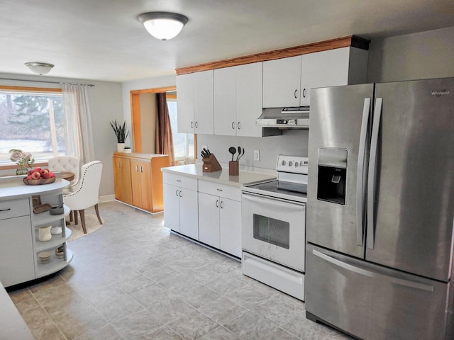 kitchen with white range with electric cooktop, range hood, white cabinetry, stainless steel fridge with ice dispenser, and light countertops