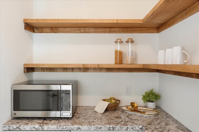 interior details featuring stainless steel microwave