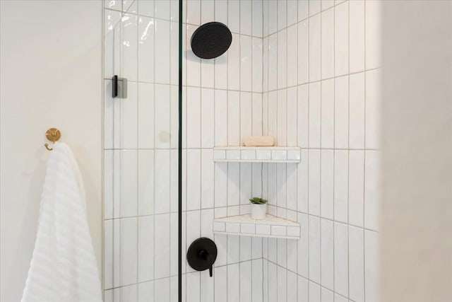 room details with a tile shower