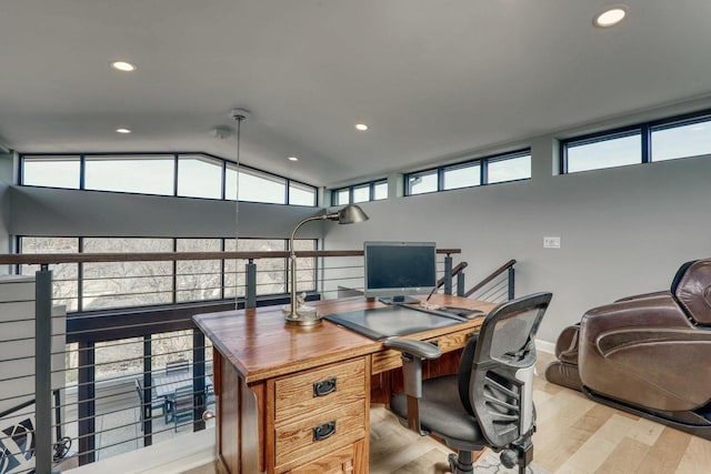 office area featuring recessed lighting, light wood-type flooring, and vaulted ceiling