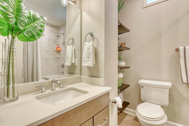 full bath featuring vanity, baseboards, tile patterned flooring, shower / tub combo, and toilet