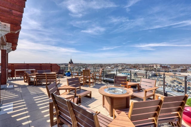 view of patio featuring an outdoor fire pit