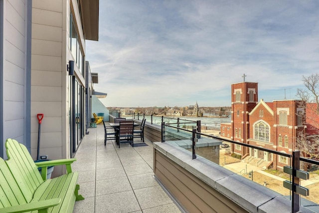 balcony with outdoor dining area