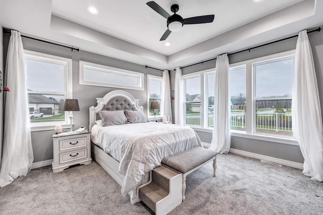 bedroom featuring light carpet, recessed lighting, a ceiling fan, and baseboards