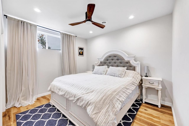 bedroom featuring visible vents, baseboards, light wood finished floors, recessed lighting, and ceiling fan