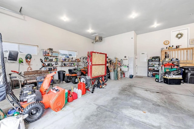 garage with a workshop area