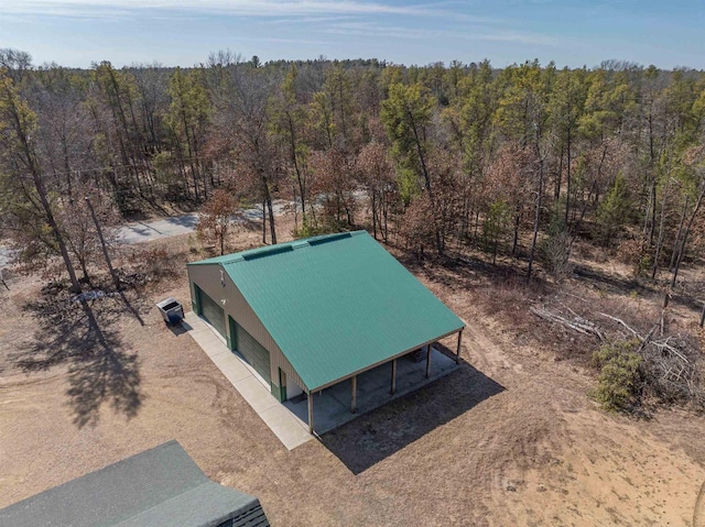 aerial view featuring a forest view