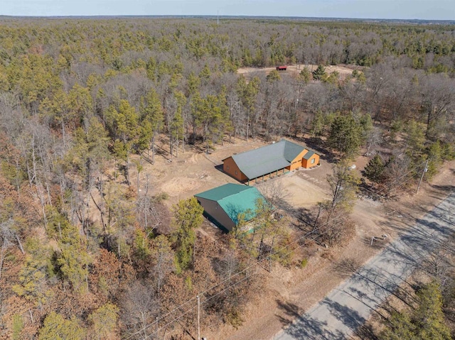 aerial view with a wooded view