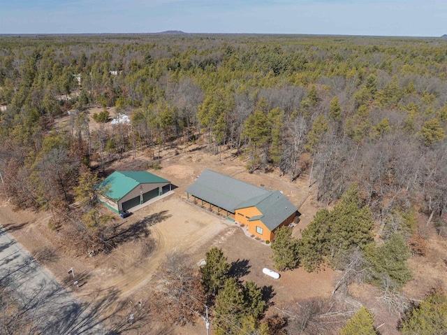 drone / aerial view with a view of trees