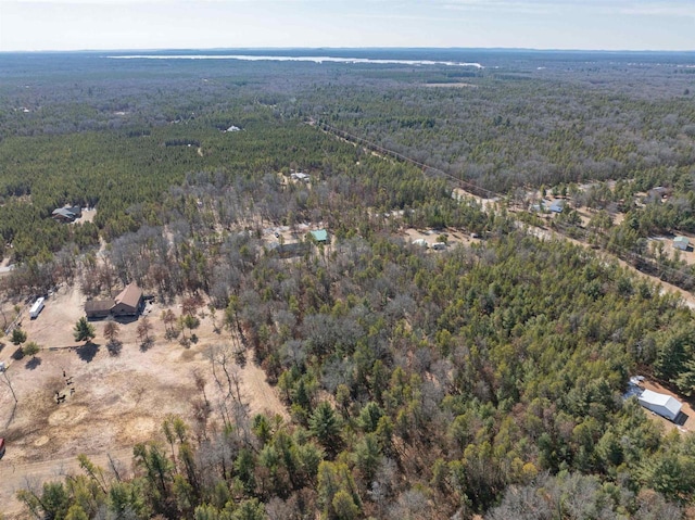 aerial view featuring a forest view