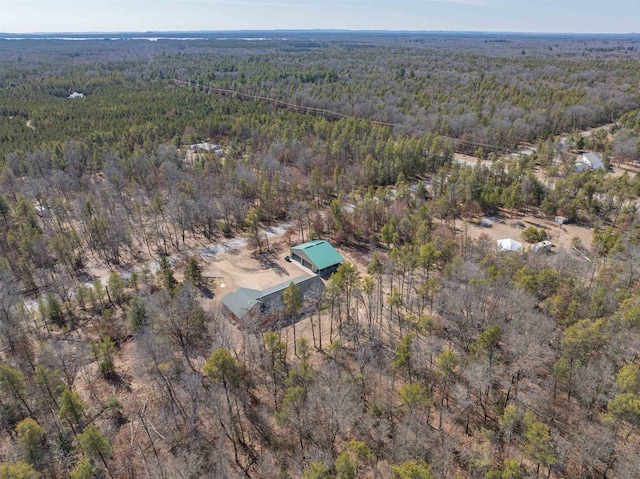 bird's eye view with a forest view