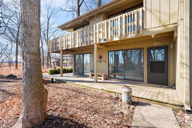 entrance to property featuring a deck