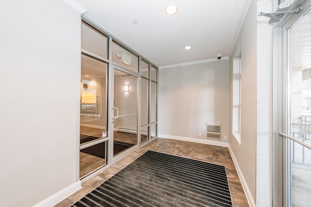 hallway featuring recessed lighting, visible vents, baseboards, and crown molding